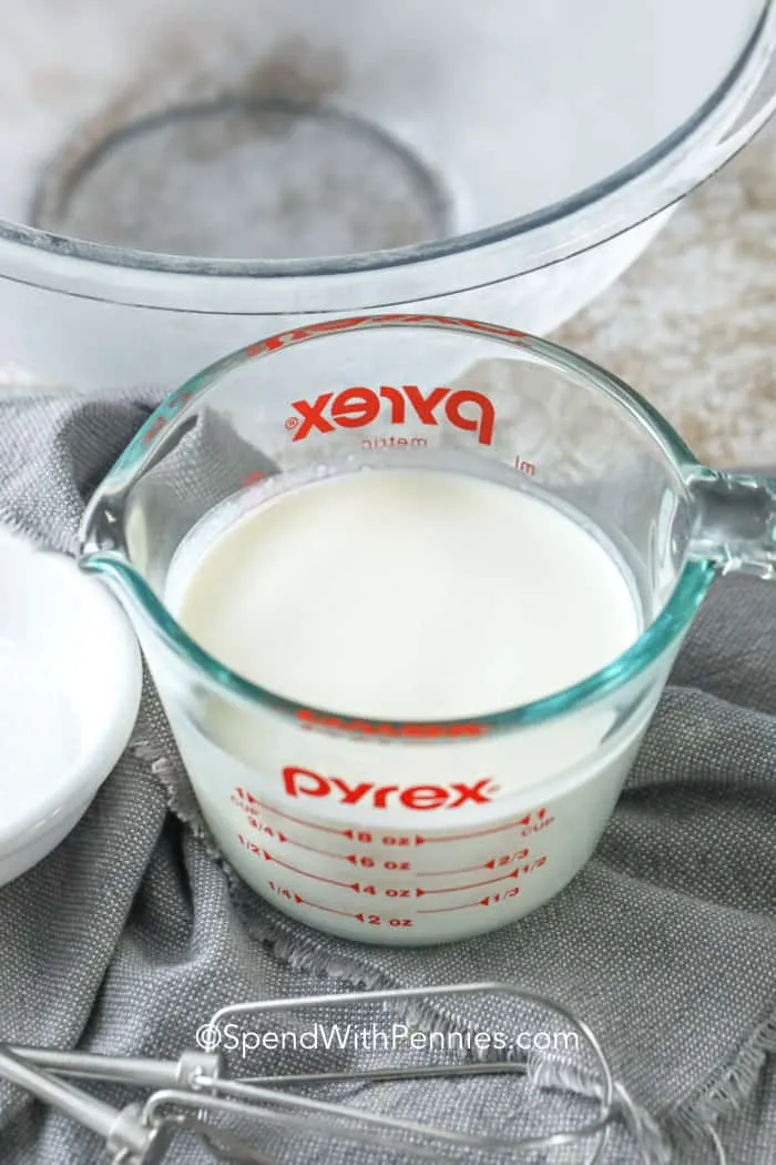 Cream in a measuring cup